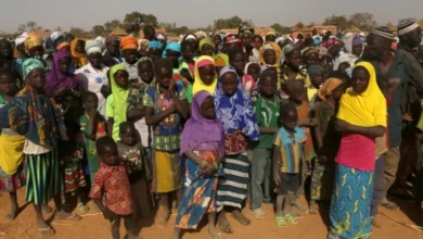 Displaced people wait for help at a village in Dablo area, Burkina Faso