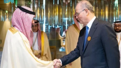 Saudi Minister of Foreign Affairs Prince Faisal bin Farhan Al Saud welcomes Palestinian Prime Minister Mohammad Mustafa ahead of an OIC and Arab League foreign ministers' meeting in Riyadh, November 10, 2024