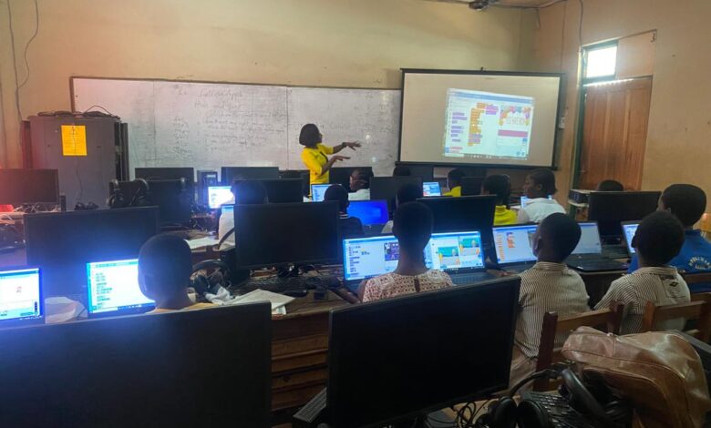 A facilitator taking the girls in an ICT session at KSTS