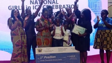 Success Joycelyn Dadzie (middle) surrounded by the Minister for Communications and Digitalisation, Mrs. Ursula Owusu-Ekuful and family members