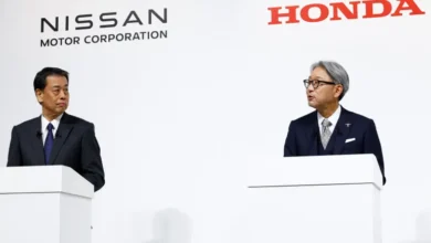 Nissan President Makoto Uchida and his counterpart at Honda, Toshihiro Mibe, hold a joint news conference on their merger plans, in Tokyo, Japan, on December 23, 2024