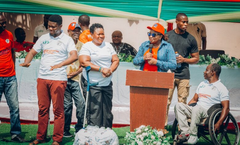 Madam Patricia Appiagyei, MP for Asokwa and Deputy Majority Leader addressing PWDs in Asokwa during the world disability day.