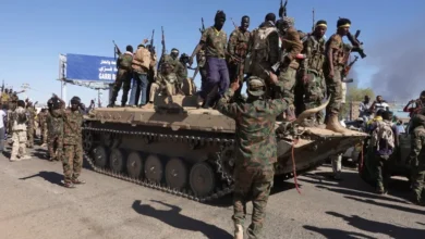 Sudanese army soldiers celebrate after retaking an oil refinery in Khartoum North on January 25, 2025 [El Tayeb Siddig/Reuters]