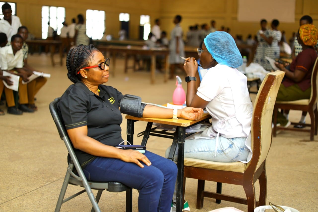 Charity Darko of Corporate Services undergoing health check prior to donating blood in Kumasi