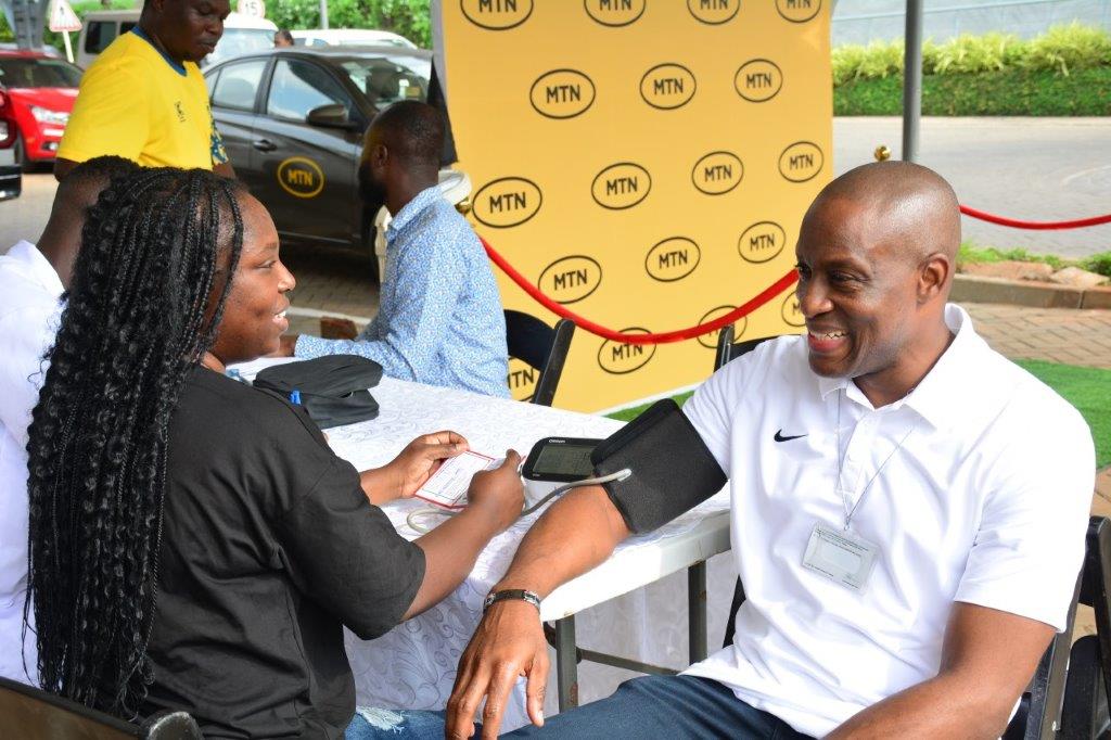 Patrick Afari, GM, Supply Chain Mangement undergoing health check before the blood donation